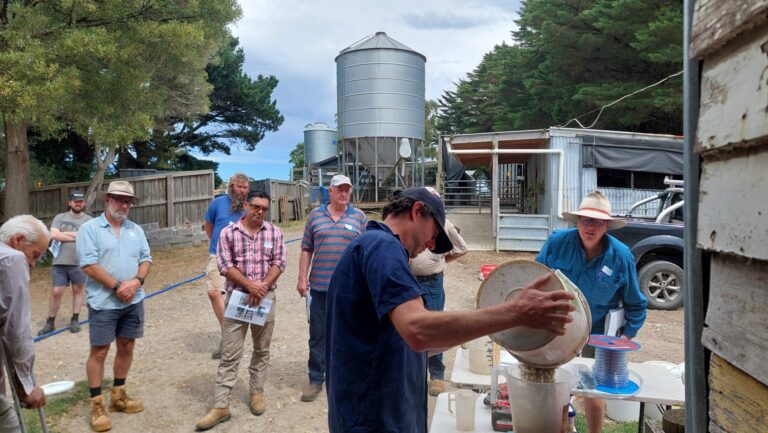 Participants observe the preparation of biofertiliser or biofert on a dairy farm in south gippsland