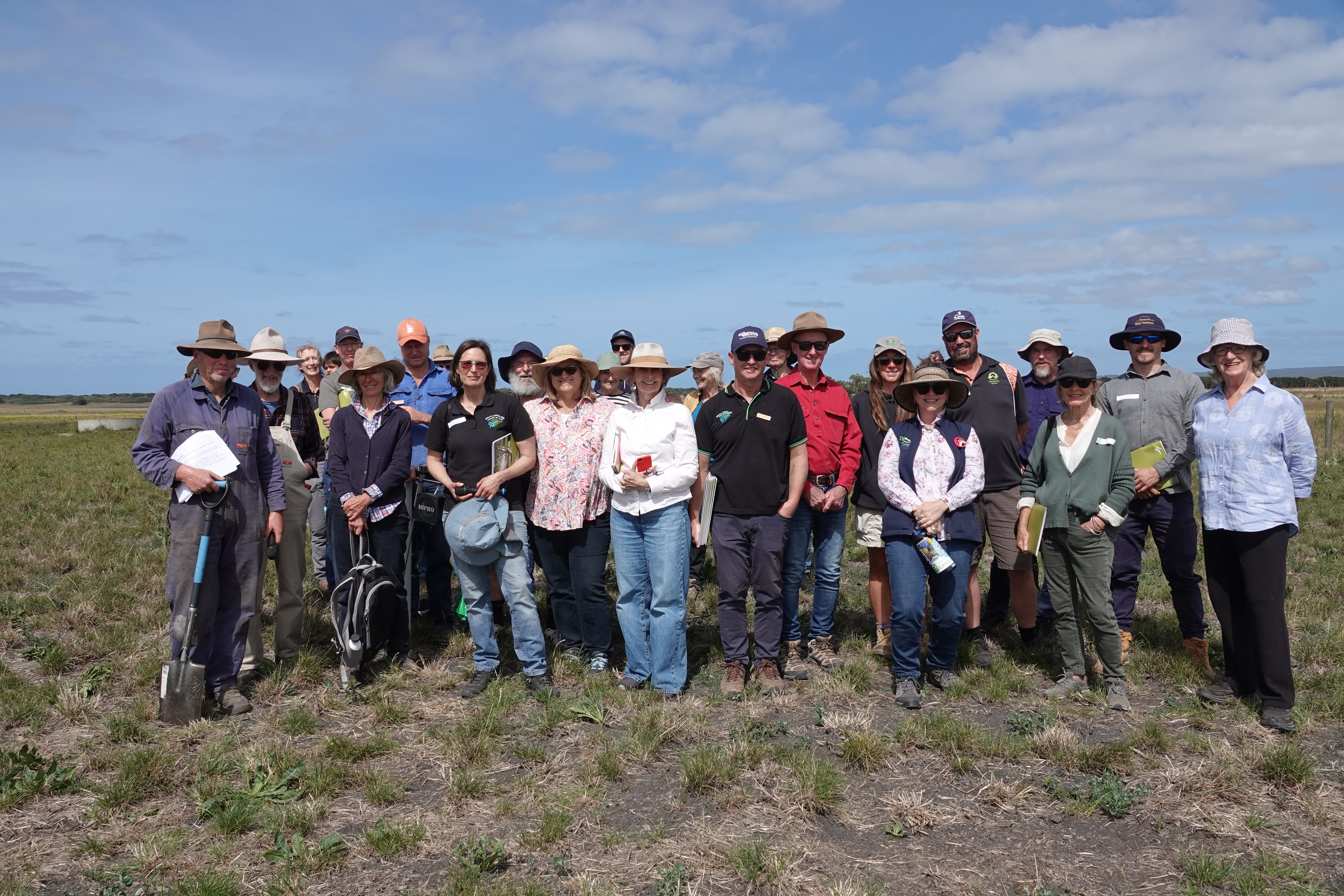 Landcare group members in a field